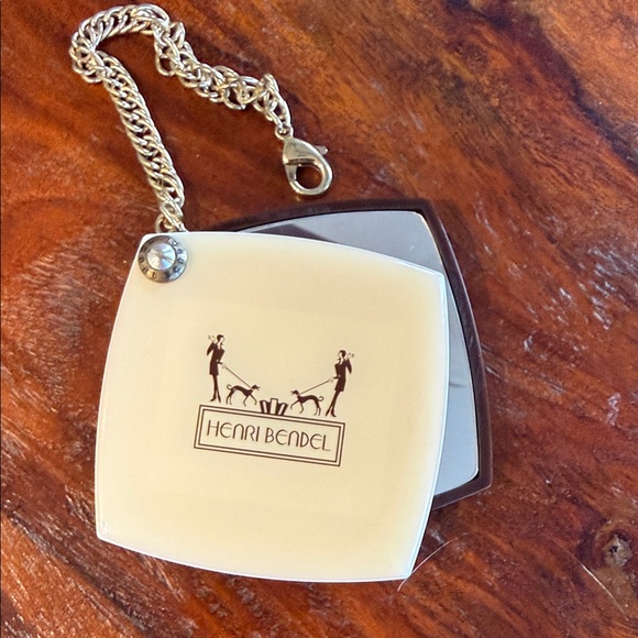 Henri Bendel Ivory and Black Compact Mirror very nice condition